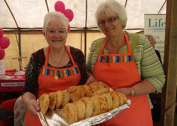 Party in the Park at Shroggs Park, Lee Mount. Pam O'Callaghan and Sue Mitchell from the St George's Mother Union serve up pasties.