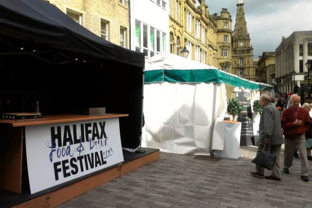 Halifax Food and Drink Festival. Early morning shot of demonstration stall being set up.