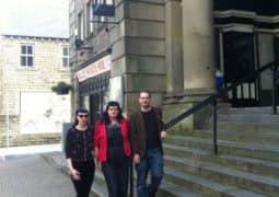 From left to right are Hebden Bridge Burlesque Festival Co-producers Lizzy 'Lady Wildflower' Goodman and Heidi 'Heidi Bang Tidy' Waddington, with Hebden Royd Town COuncillor James Baker at Hebden Bridge Picture House