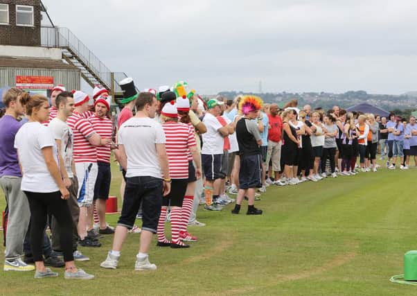 Rastrick Big Event with 'It's a Knockout' at Rastrick Cricket Club.
Competitors ready for the 'It's a Knockout' competition