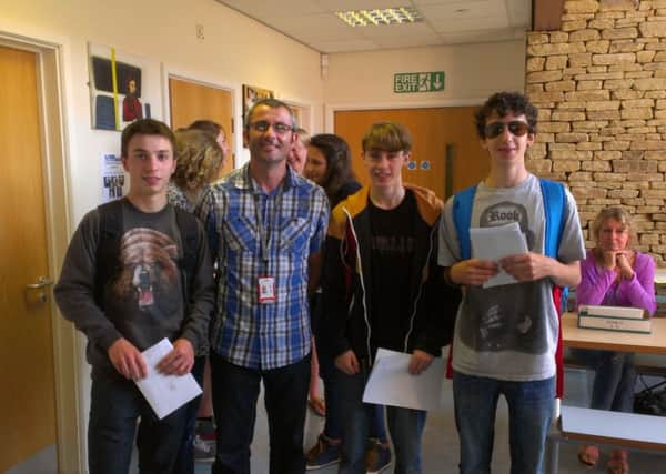 GCSE results day at Calder High School. Jack Fillingham, head of year 11 Nick Lumb, Finlay King and Louis Christodoulou