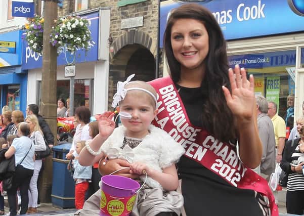 Ruby Hunt and last years gala queen Emilie Large, lead out the Brighouse Gala Parade.