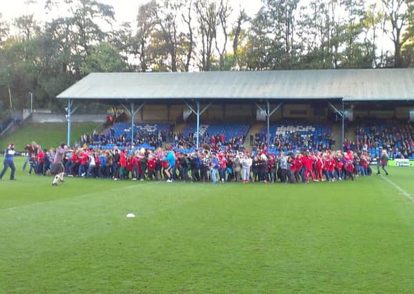Calderdale school children do the Tonga war dance the sipi tau at The Shay before the Rugby World Cup Tonga v Italy match