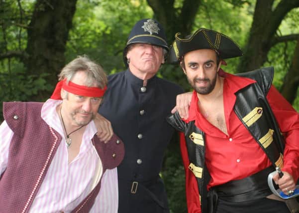 Arresting: In The Pirates of Penzance are (from the left) Steven Greenwood (Sam), Peter McDonnell (Sergeant of Police) and Ashley Davis (Pirate King).