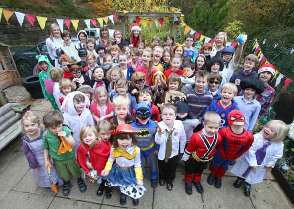 Children and staff at Cragg Vale School dressed as their Heroes for Children in Need.