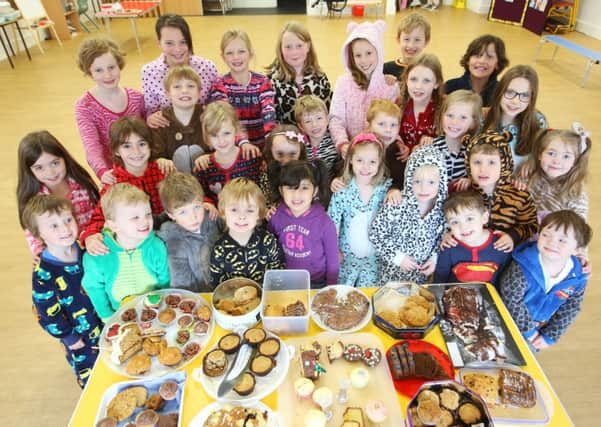 Midgley School children have a bake-off and wear onesies for Children in Need.