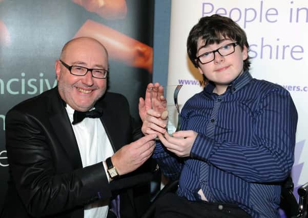 Young Archievers Awards 2013 held at Leeds United Centenary Pavilion. 
Winner of the Personality of the Year award Jack Carroll, presented by Peter McCormick on behalf of McCormick Solicitors.
(JG1001/26ac) Picture Jonathan Gawthorpe.