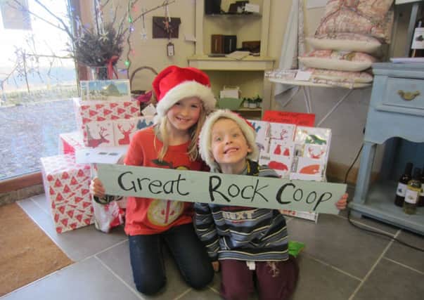 Lily and Sam Stansfield of Staups Lea Farm promoting the Great Rock Co-op festive weekends