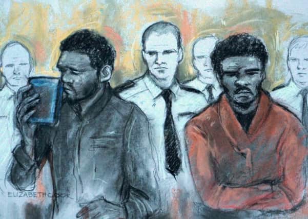 Court artist sketch by Elizabeth Cook of of Michael Adebowale and Michael Adebolajo as they were found guilty of the murder of Fusilier Lee Rigby. PRESS ASSOCIATION Photo. Picture date: Thursday December 19, 2013. See PA story COURTS Woolwich. Photo credit should read: Elizabeth Cook/PA Wire