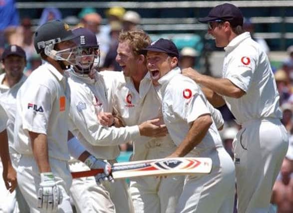 Richard Dawson (centre) celebrates a wicket for England in Sydney in 2003