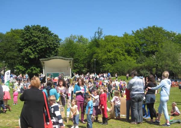 Crowds gather in the sun at Centre Vale Park for one of the town's great community events, Todmorden  Carnival, last summer