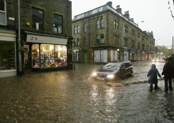 Flooded Market Street on Sunday evening in Hebden Bridge.