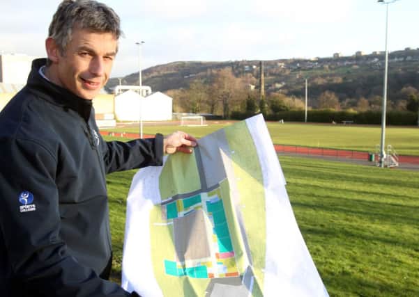Martin Moorman, head of Ravenscliffe Hgh, with plans for new college, at Spring Hall, Halifax