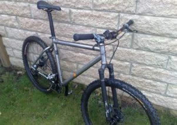Police are appealing for information following the theft of two distinctive mountain bikes from outside a pub in Luddenden