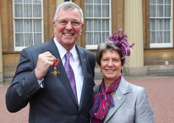 Allan Jagger, chairman of KITS in Brighouse, received his OBE from Prince Charles during a ceremony at Buckingham Palace. Pictured with his wife Rose