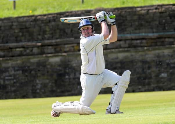 Southowram's Ben Wells hits out on his way to 50 at Booth