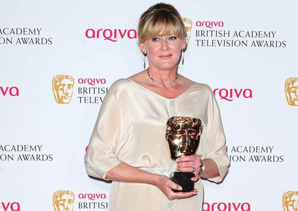 Sarah Lancashire with the Supporting Actress Award for Last Tango in Halifax,  at the Arqiva British Academy Television Awards 2014 at the Theatre Royal, Drury Lane, London. PRESS ASSOCIATION Photo. Picture date: Sunday May 18, 2014. See PA story SHOWBIZ Bafta. Photo credit should read: Ian West/PA Wire