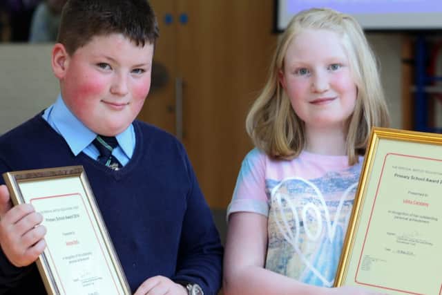 Primary School Awards at Carr Green School, Rastrick. George Kelly aged ten and Libby Carstairs aged eleven.