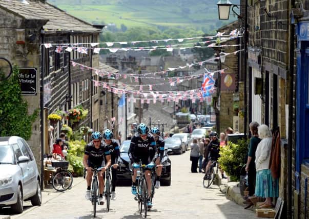 Chris Froome (front right ) and his Team Sky colleagues will be riding through Calderdale on July 6