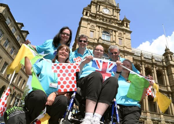 Tour Maker volunteers outside Halifax Town Hall.
Back, from the left, Chatherine Chippindale, Paul McRae and Ted Ashman.
Front, Jane Davy, Alison Schofield and Maggie Blaylock.