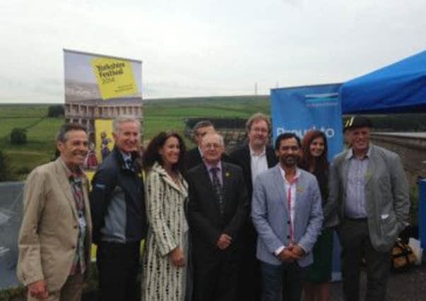Representatives from Pennine Prospects,Welcome to Yorkshire, Yorkshire Water, Fields of Vision, the artist Imran Qureshi, Calderdale Council's leader Coun Tim Swift at the unveiling of the Fields of Vision project.