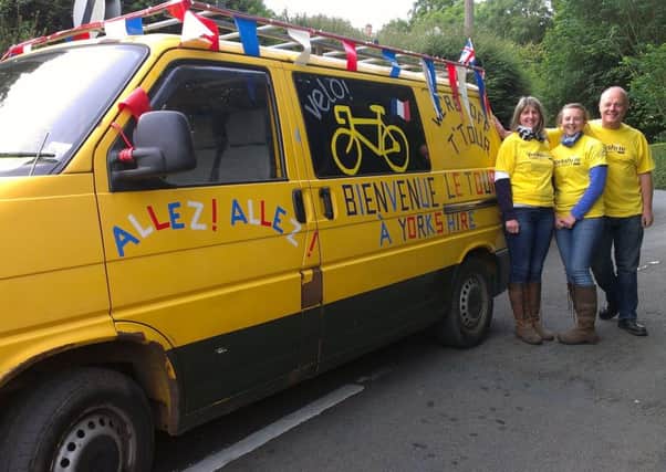 Ready for Le Tour in Ripponden: Hazel, Hattie and Andrew Noble, of Hebden Bridge, with their specially decorated van