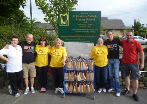 Staff and volunteers at St Patrick's Primary School, Elland, have prepared packed lunches for spectators on the route