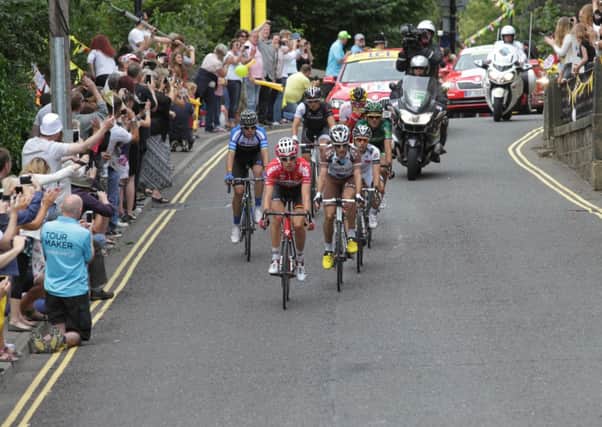Tour de France breakaway ridesr race through Calderdale