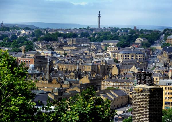 Date:1st July 2013.
Possible Picture Post: A view across the former industrial town of Halifax, showing one of the town's attractions Wainhouse Tower, a folly in the parish of King Cross, on the south west side of Halifax. Standing at 275 feet (84 m), it is the tallest structure in Calderdale and the tallest folly in the world, and was erected in four years between 1871-1875. The main shaft is octagonal in shape with a square base and 403 stairs leading to the first of two viewing platforms.
The tower was designed by architect Isaac Booth as a chimney to serve the dye works owned by John Edward Wainhouse (1817-1883). The height of the chimney was to satisfy the Smoke Abatement Act of 1870 which required the building of a tall chimney, to carry smoke out of the valleys in which the factories were built. A much simpler chimney would have satisfied the requirements but Wainhouse insisted that it should be an object of beauty. In 1874 John Wainhouse sold the mill to his works manager who refused to pay the cost o