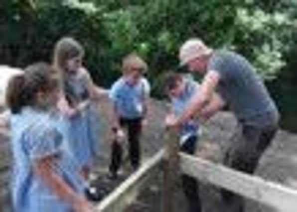 Sacred Heart pupils learn building skills from Hebden Bridge's Eight Space's Sean Creagh