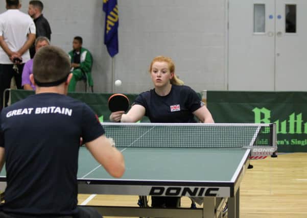 Todmorden's Megan Shackleton on her way to gold in the final match against GB team-mate Daniel Bullen in the  IWAS World Junior Games