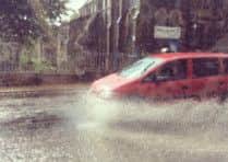 Mizkittyfantastiko (@Kitty_Pickle) tweeted this photo of cars wading through water outside Boothtown Methodist Church, Halifax, after heavy rain on Friday, August 8, 2014