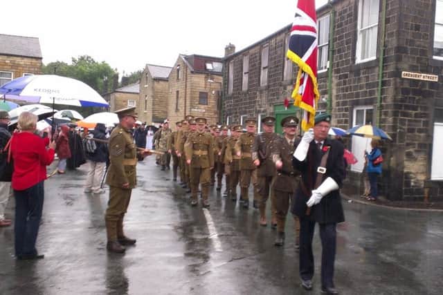 The reformed 1/6th Lancashire Fusiliers set out from Todmorden on their march to Rochdale, August 10, 2014, a hundred years after their forbears in the Territorial Army did so at the start of the First World War