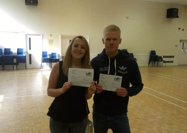 Harriet Harbidge and Jack Wrench from Todmorden High School with their A-Level results.
