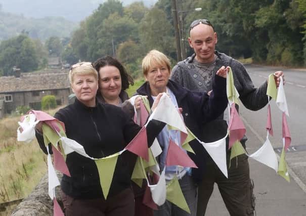 The bunting raised money for Calder Valley Search and Rescue From the left, Sharon Le Corre, Isla Salisbury, Judith Schofield and Vernon Le Corre.
