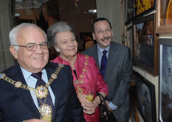 St. Peter's photo exhibition for Martin House. The Mayor of Harrogate Cllr. Jim Clark, The Mayoress of Harrogate Cllr. Shirley Fawcett and photographer Steve Martin.(140905AM1)