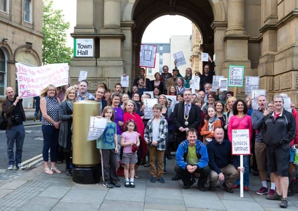 Hebden Bridge locals gather at Halifax Town Hall to protest the plans for a supermarket in Hebden Bridge