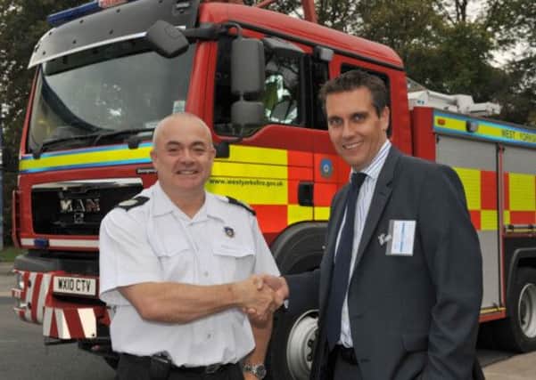 Assistant Chief Fire Officer Dave Walton and Stuart Wiggans, Senior Director, 
Compliance - Retail Operations (Asda).
