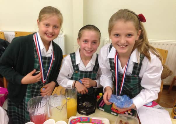 Brackenfield School coffee morning in aid of Macmillan Cancer Care. Isabelle Murtagh, Daisy Wallace and Charlotte Saint-Marc (s).