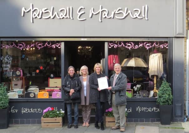Pictured receiving the award from Chairman of the Trust, John Culpan are Brigitte Marshall and Denise Hawtin, along with Trust member Barbara Green.