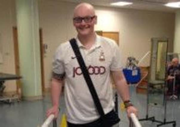William Binns walks for the first time after his leg was amputated when medics discovered a rare cancerous tumour