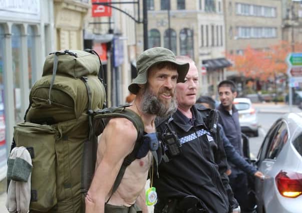 Stephen Gough - the naked rambler leaves Halifax Police Station after being arrested in Hebden Bridge.