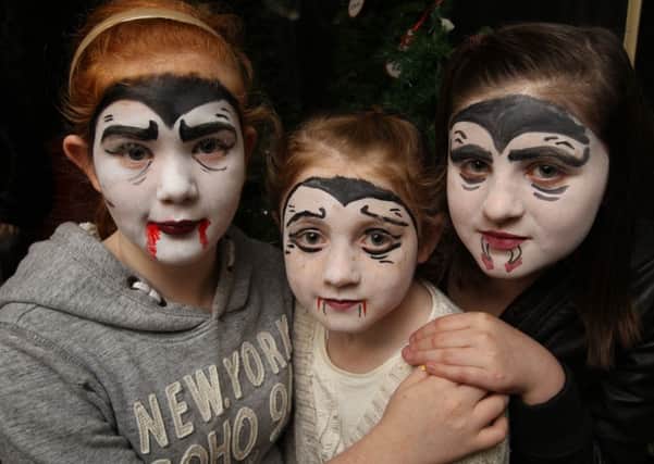 Students from Bradford College Media Make Up & Special effects department Halloween face painting at Kershaw Garden Centre, Brighouse. Charlotte Noden 11, Sophie Wittekind nine and Jemma Wittekind 11.