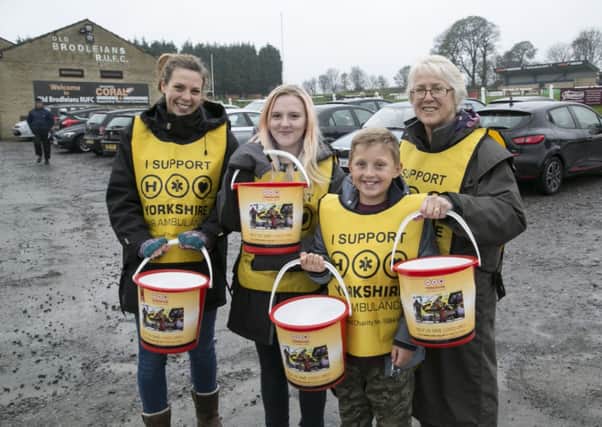 Yorkshire Air Ambulance fundraiser at the Old Brods rugby club, Hipperholme. From the left, Jenny Eastham, Leanne Openshaw, Olly Rathmell, nine, and Ann Littlewood.