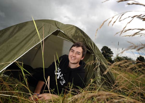 Jacob Hill, the Lazy Camper, pictured with one of his tents at his home at his home at Brighouse...7th August 2012...Picture by Simon Hulme