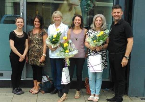 The team at Edward and Co. joined by Janet Barton, Laura Whitham and Julie Davidson from Overgate Hospice.