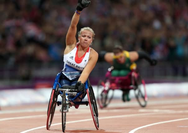 Great Britain's Hannah Cockroft celebrates winning Gold in the Women's 100m - T34 Final at the Olympic Stadium, London. PRESS ASSOCIATION