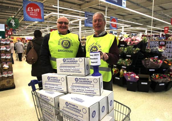 Tony Nerbert and Brian Hulin with Rotary Shoe Boxes at Tesco's, Brighouse.