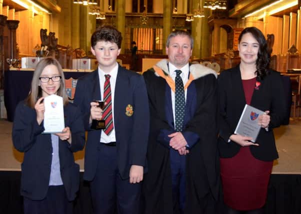 Hipperholme Grammar School's Awards Night at Bradford Cathedral. Prize winners Hannah Coe, Jarred Bland, headmaster Jack Williams and Lydia Chin