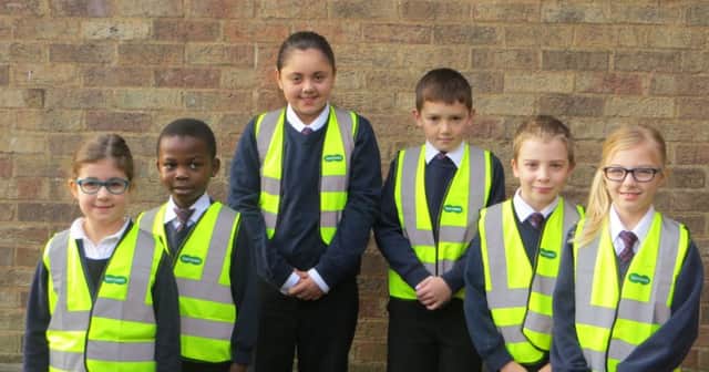Brighouse Specsavers donates high vis vests to Field Lane primary school (1)